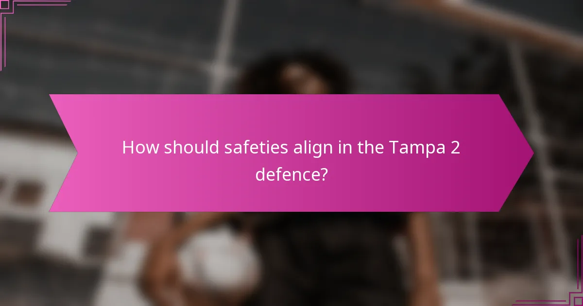 How should safeties align in the Tampa 2 defence?